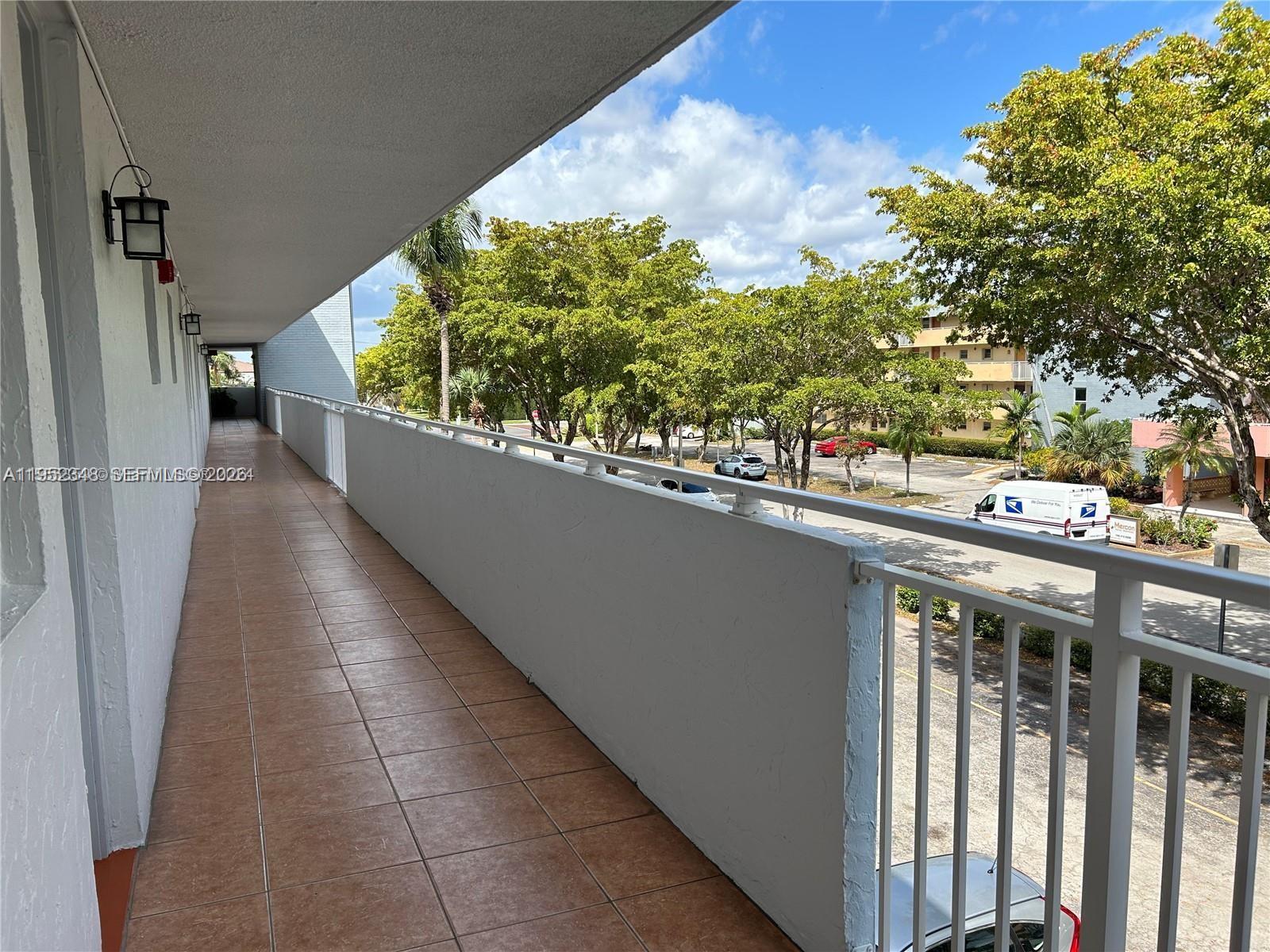 3550 Northeast 169th Street, Unit 304 North Miami Beach, FL 33160 - Photo 23 of 25 a view of balcony