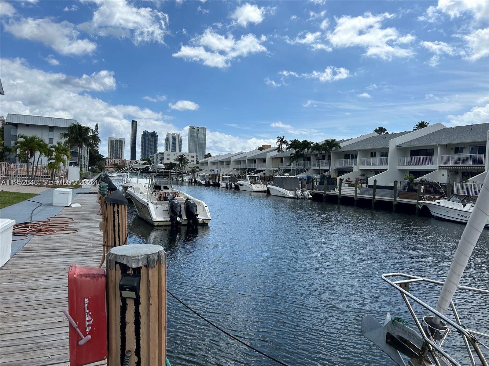 3550 Northeast 169th Street, Unit 304 North Miami Beach, FL 33160 - Photo 7 of 25 a view of a lake