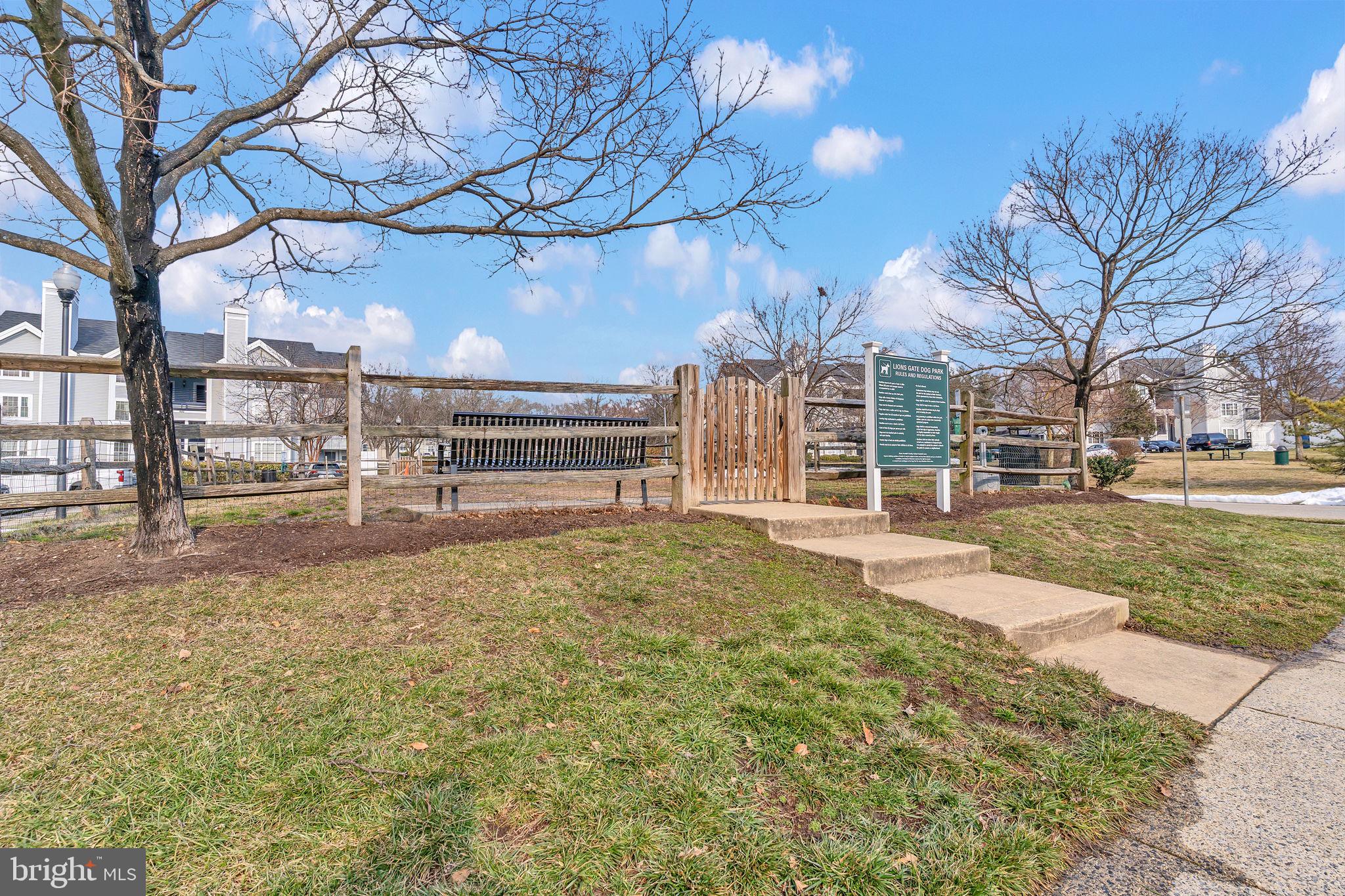604 Moonglow Road, Unit 104 Odenton, MD 21113 - Photo 19 of 19 a view of a house with a yard