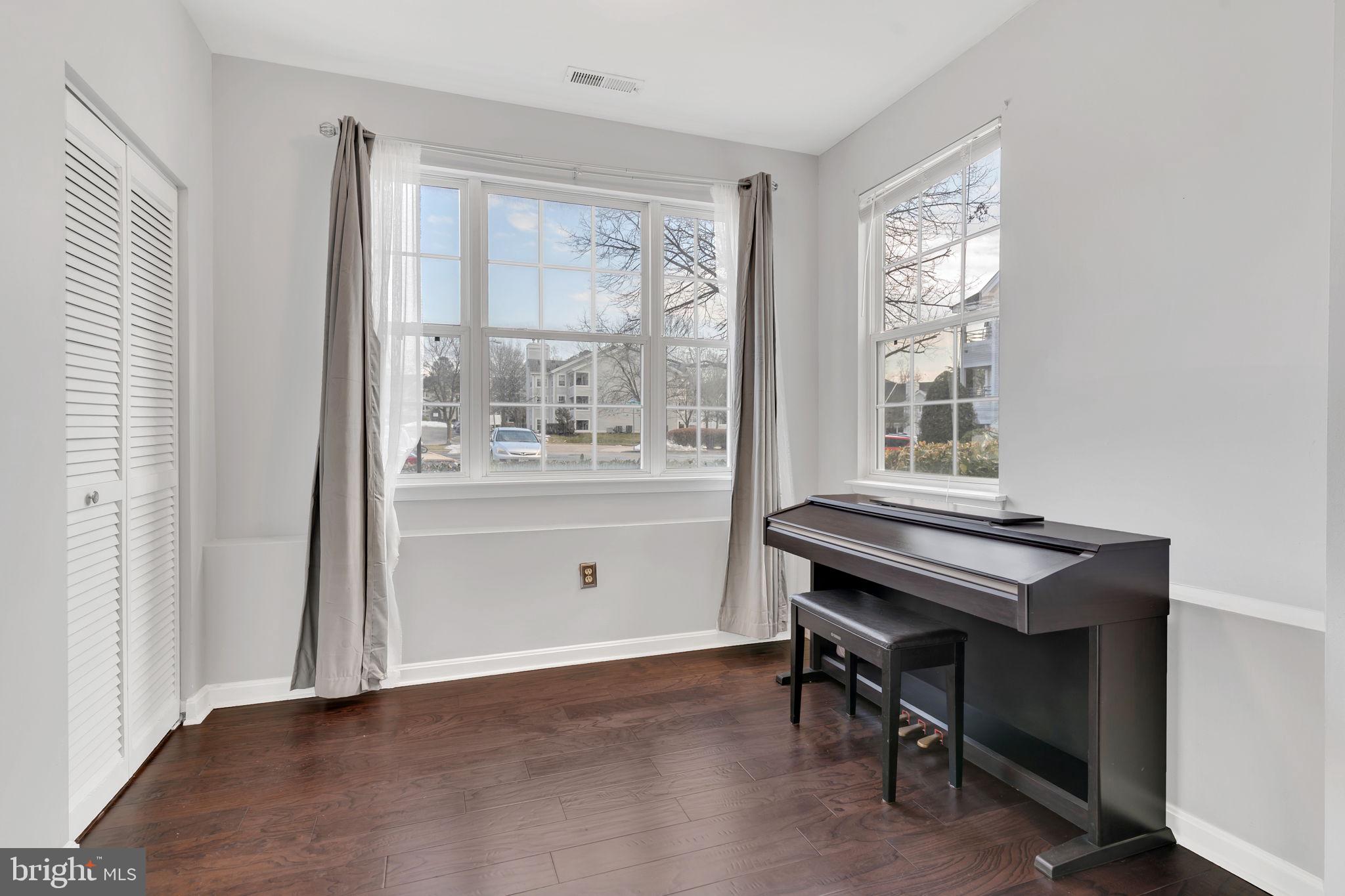 604 Moonglow Road, Unit 104 Odenton, MD 21113 - Photo 5 of 19 a room with furniture and a window