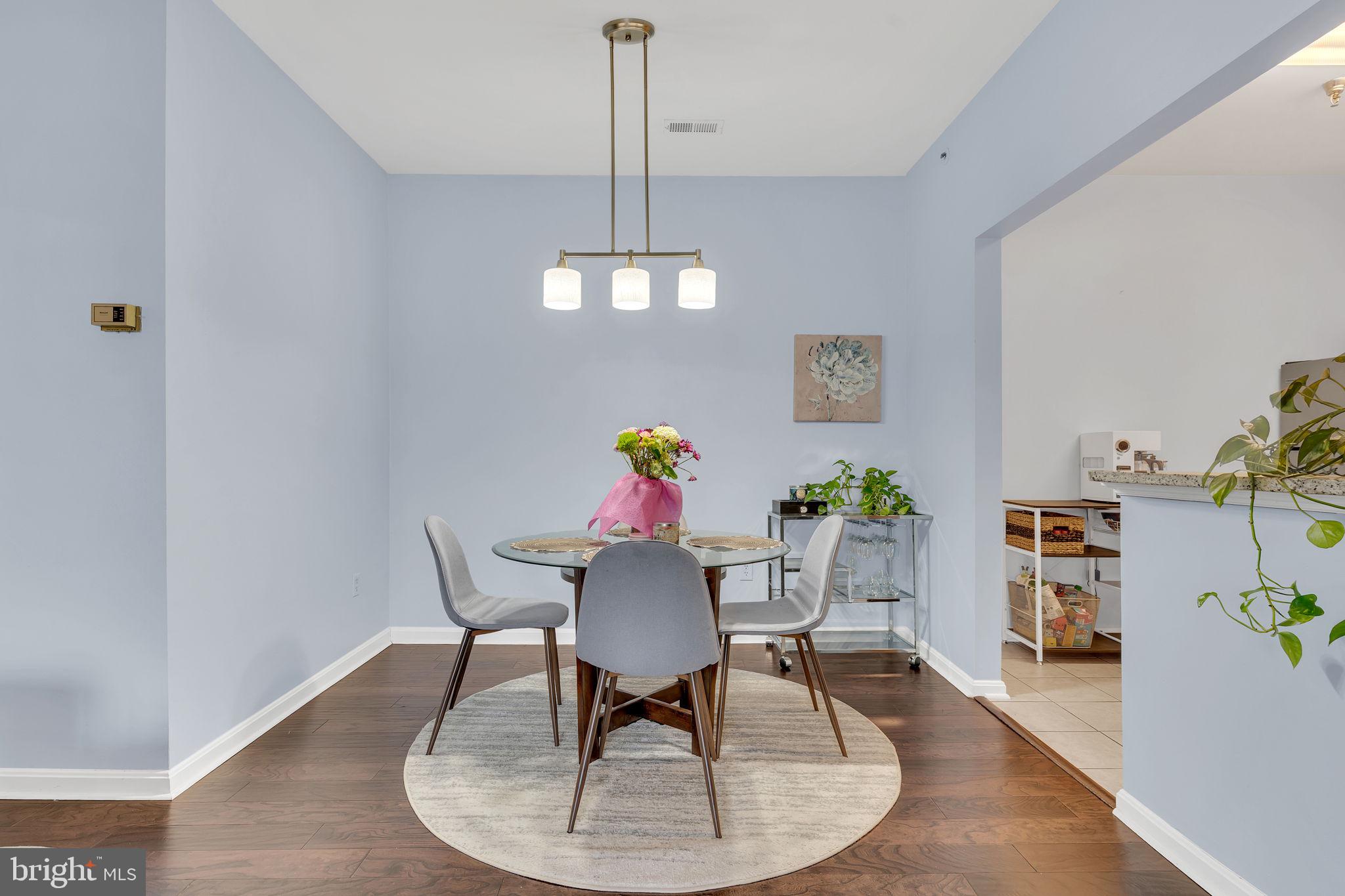 604 Moonglow Road, Unit 104 Odenton, MD 21113 - Photo 6 of 19 a workspace with furniture and a potted plant