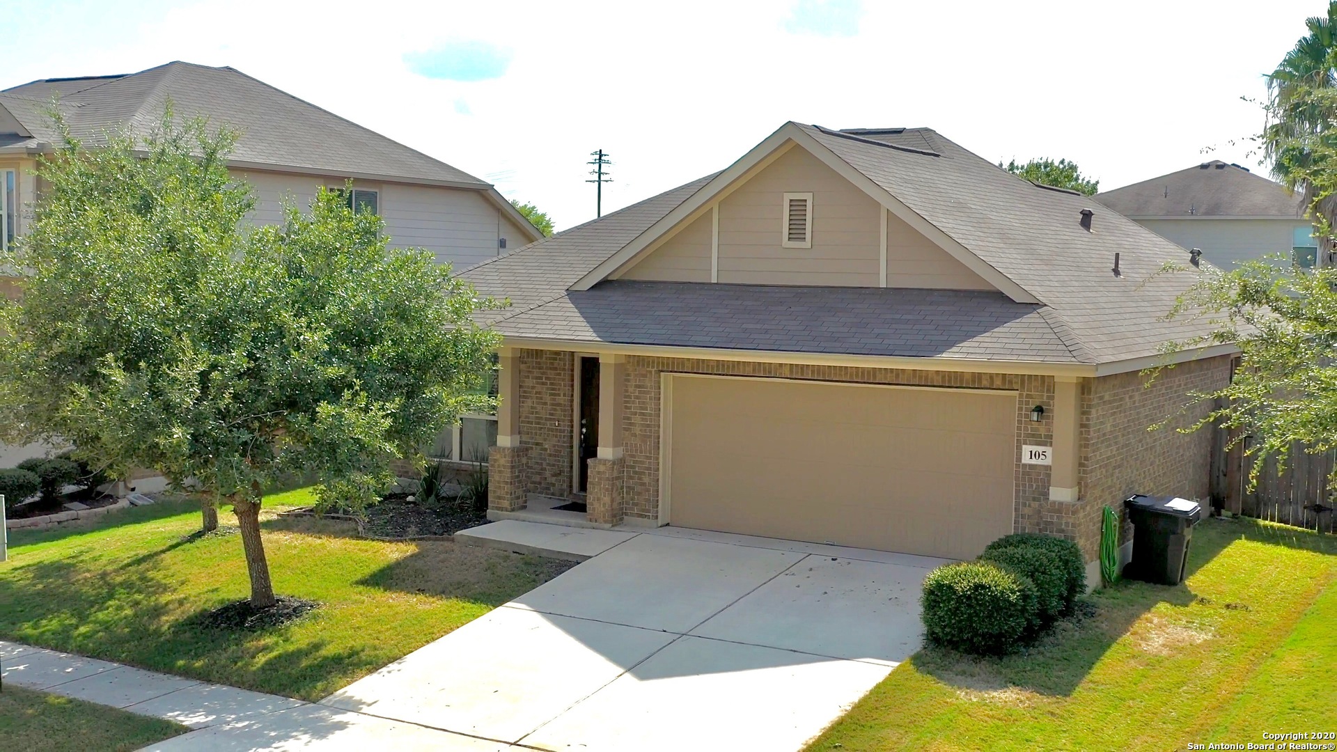 105 Buckskin Way Cibolo, TX 78108 - Photo 1 of 9 a front view of a house with garden