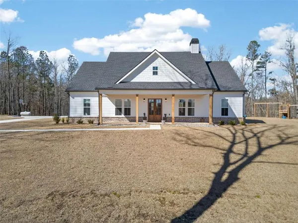 a view of a backyard of a house