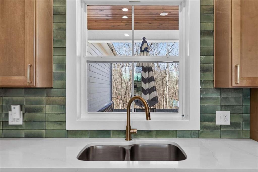 433 Old Roanoke Road Bowdon, GA 30108 - Photo 14 of 52 a kitchen sink with a window