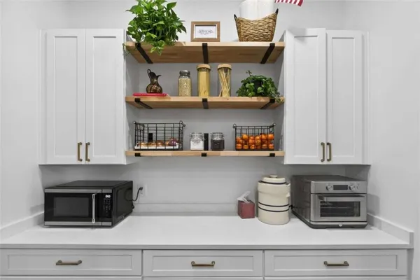 a bathroom with a toilet and a sink