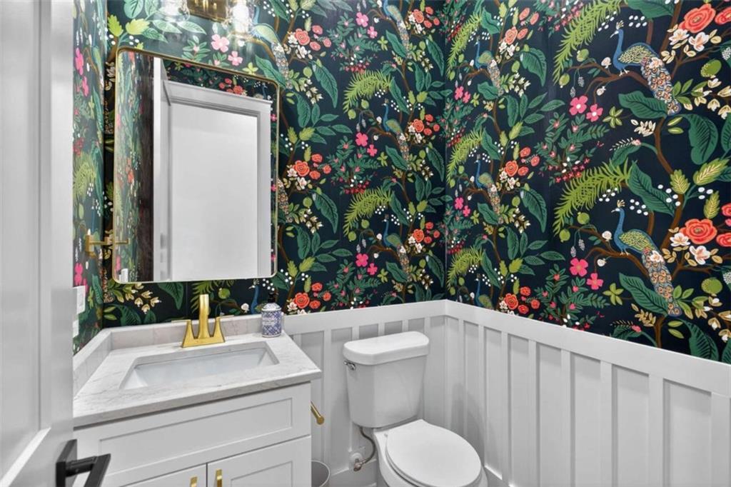 433 Old Roanoke Road Bowdon, GA 30108 - Photo 18 of 52 a bathroom with a toilet and a sink