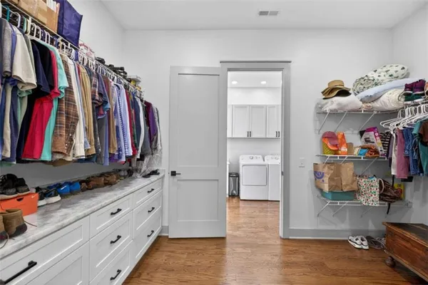 a utility room with cabinets