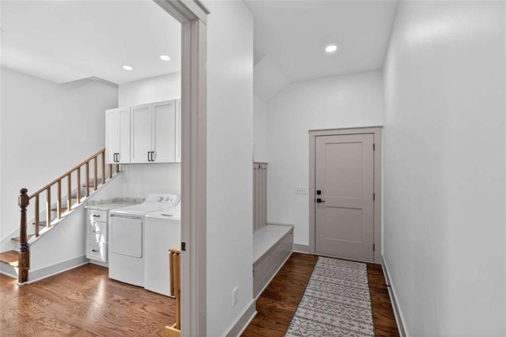 433 Old Roanoke Road Bowdon, GA 30108 - Photo 32 of 52 a view of a hallway with bathroom and wooden floor