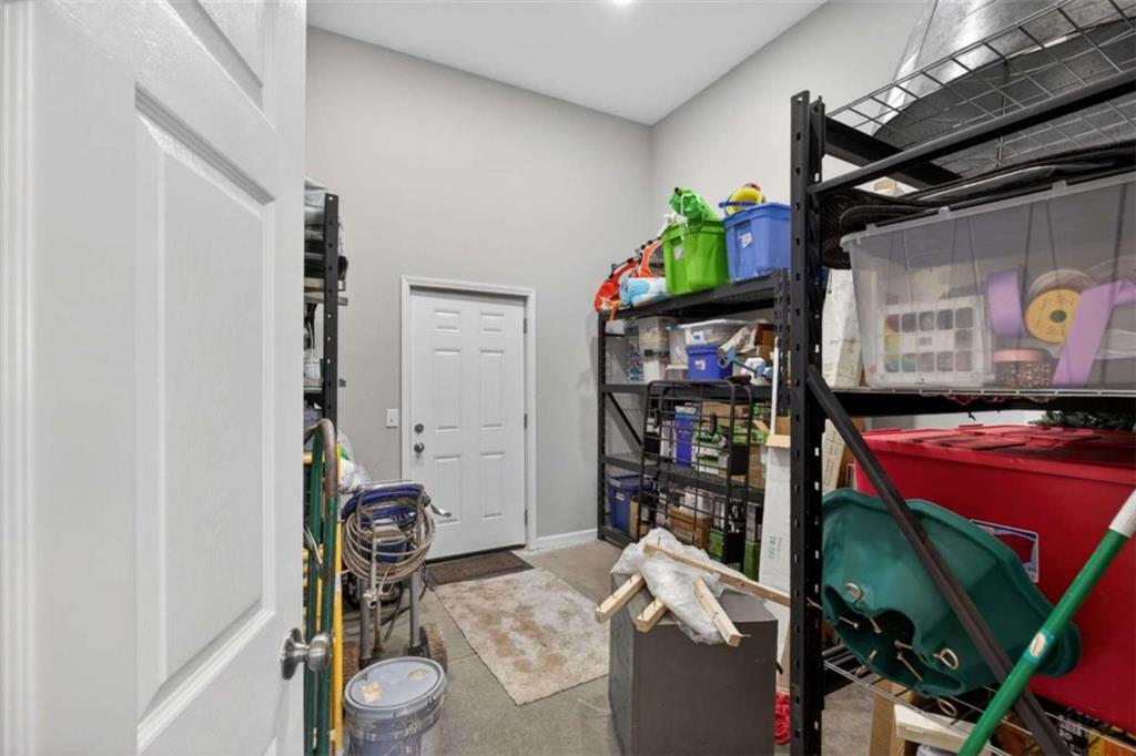 433 Old Roanoke Road Bowdon, GA 30108 - Photo 45 of 52 a room with storage and utility