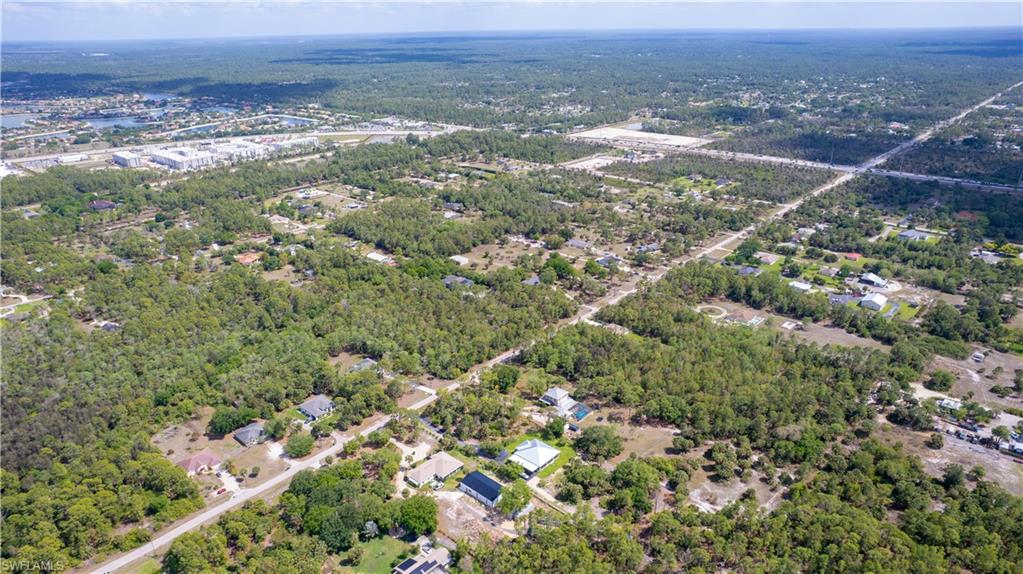 0 Wilson Boulevard North Naples, FL 34120 - Photo 6 of 8 an aerial view of residential building and green space