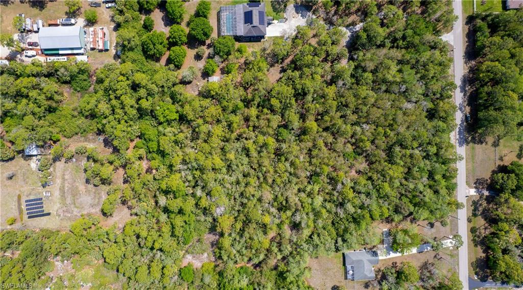 0 Wilson Boulevard North Naples, FL 34120 - Photo 8 of 8 an aerial view of a house with a yard