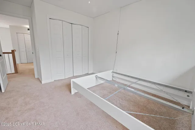 a view of a room with an empty space