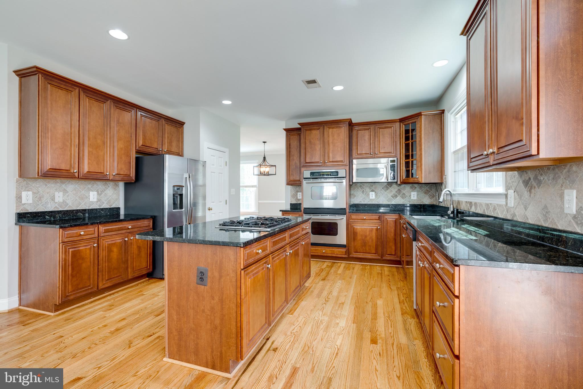 6622 Winstead Manor Court Lorton, VA 22079 - Photo 16 of 79 Stainless appliances & granite counters