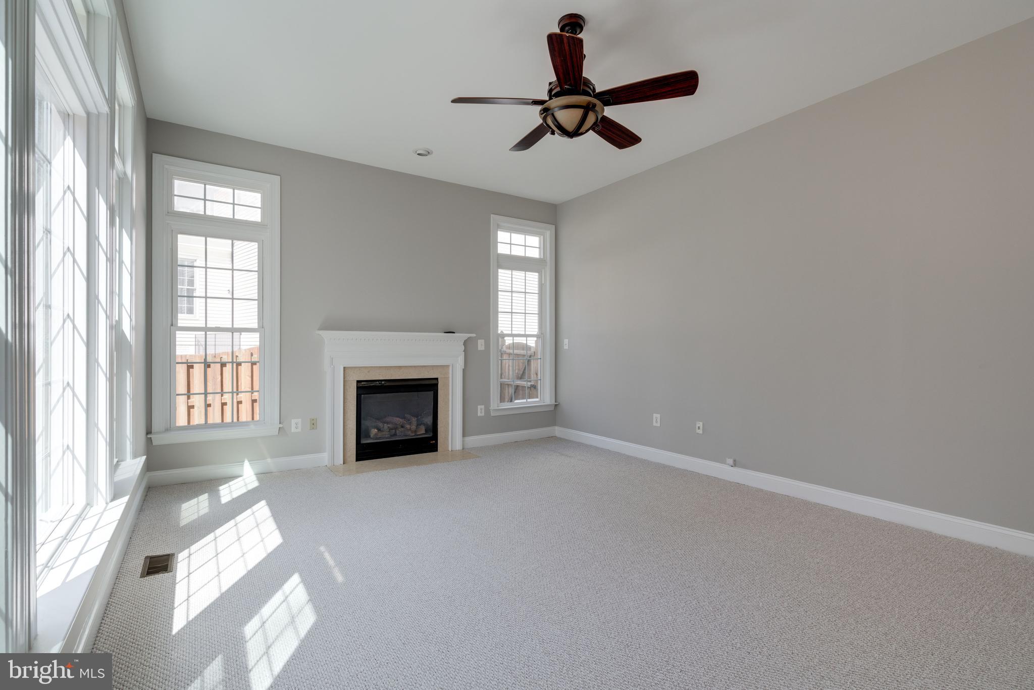 6622 Winstead Manor Court Lorton, VA 22079 - Photo 21 of 79 Family room with gas fireplace