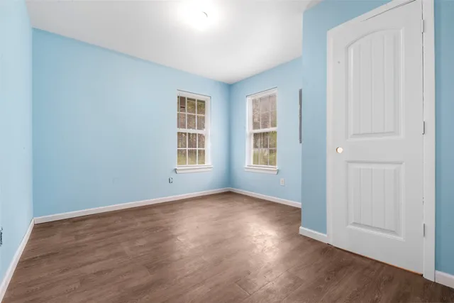 an empty room with windows