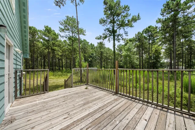a view of deck with a lake view
