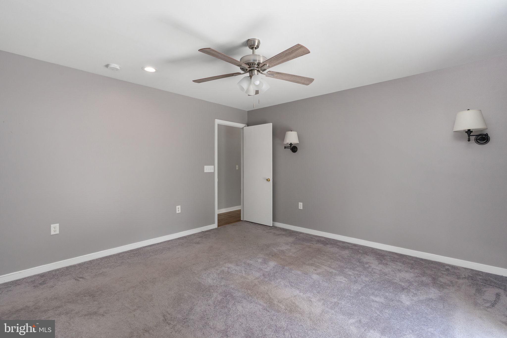8009 Burrell Road Fredericksburg, VA 22407 - Photo 27 of 66 Spacious room with soft gray tones.