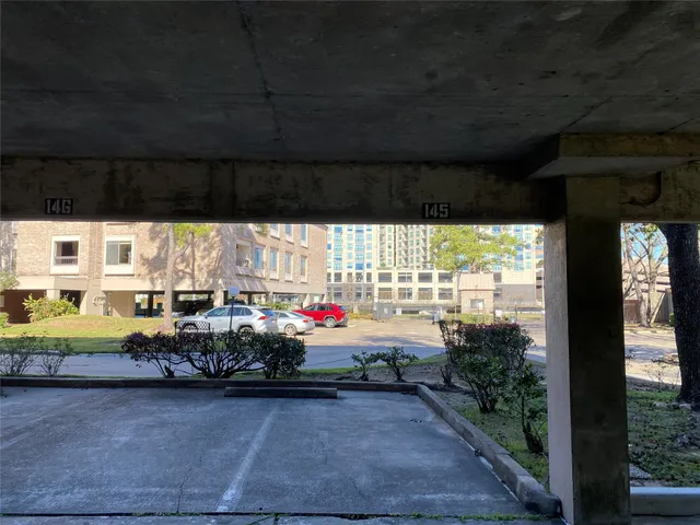 a view of car parked in garage