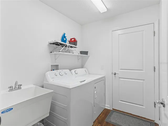 a utility room with dryer and washer