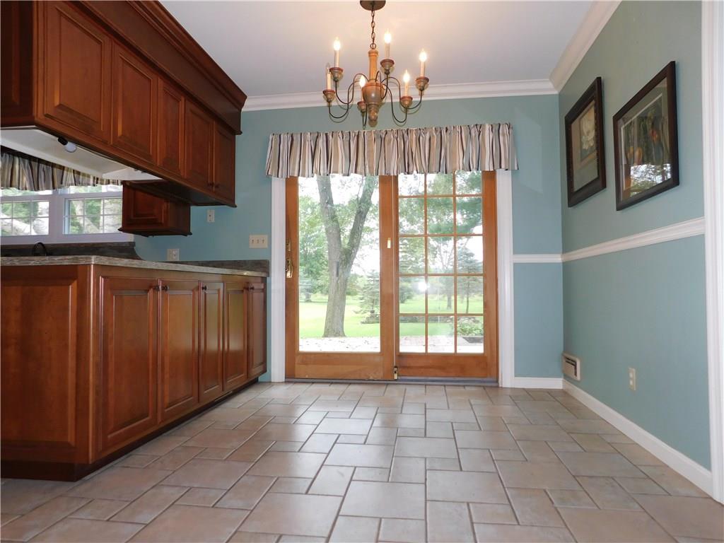 590 Methodist Road Greenville, PA 16125 - Photo 12 of 25 DINING ARE IN KITCHEN HAS EXIT DOOR TO REAR BRICK PATIO AND POOL