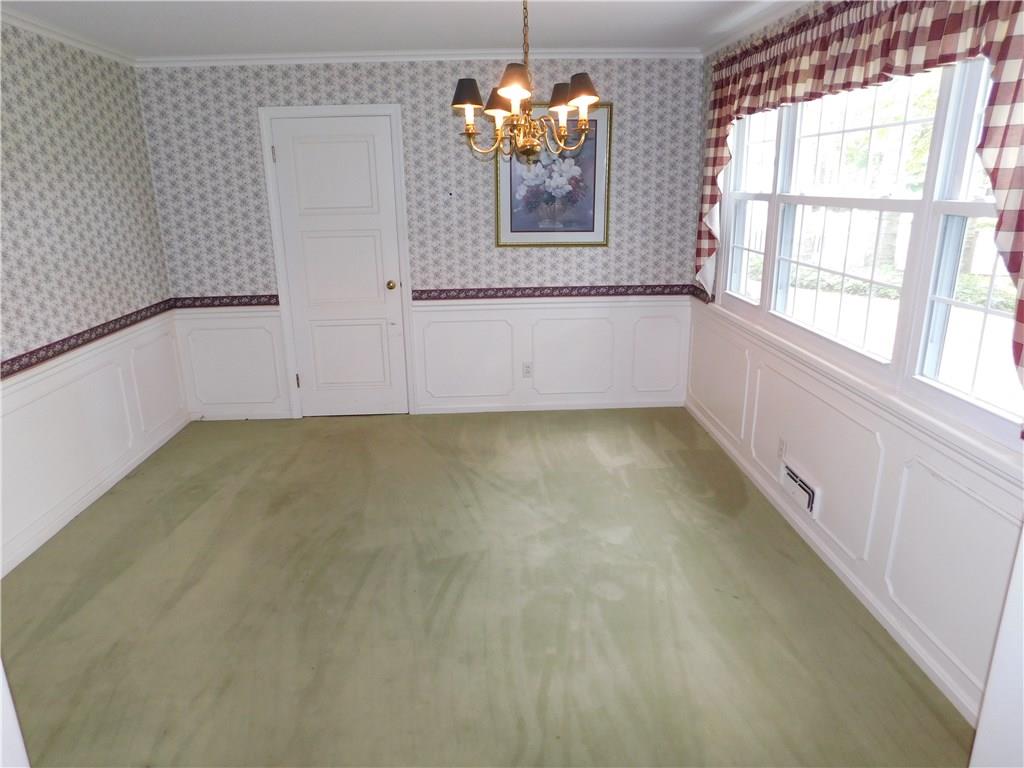 590 Methodist Road Greenville, PA 16125 - Photo 15 of 25 FORMAL D.R. WITH WAINSCOTING & PRIVACY DOOR TO KITCHEN/OVERLOOKS REAR YARD