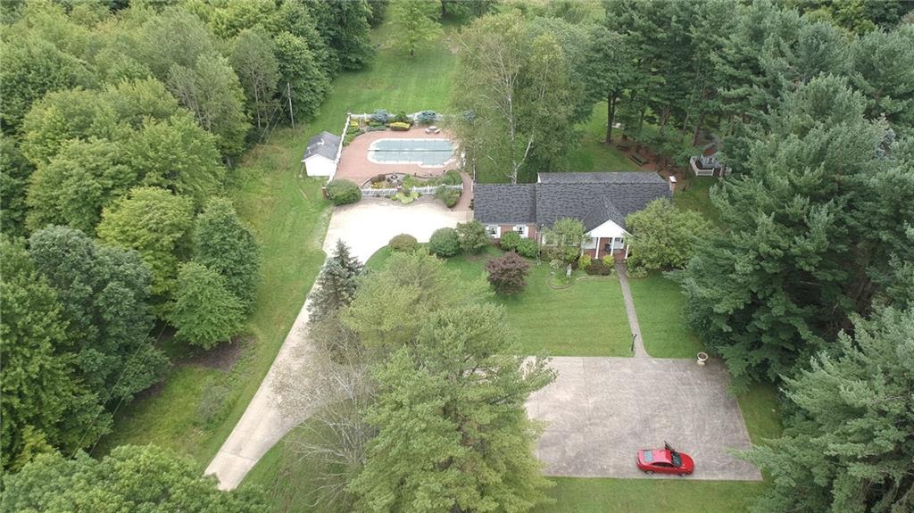 590 Methodist Road Greenville, PA 16125 - Photo 3 of 25 3 WONDERFUL ACRES/PAVED DRIVEWAY/IN GROUND POOL SURROUNDED BY AND BRICK PATIO & VINYL FENCING