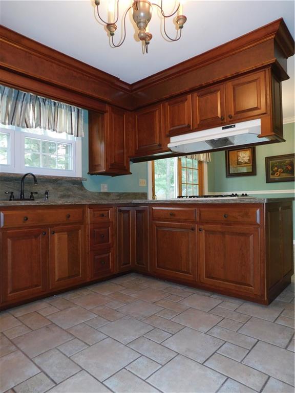 590 Methodist Road Greenville, PA 16125 - Photo 9 of 25 BEAUTIFUL CUSTOM CHERRY KITCHEN WITH TILE FLOORING AND APPLIANCE PACKAGE