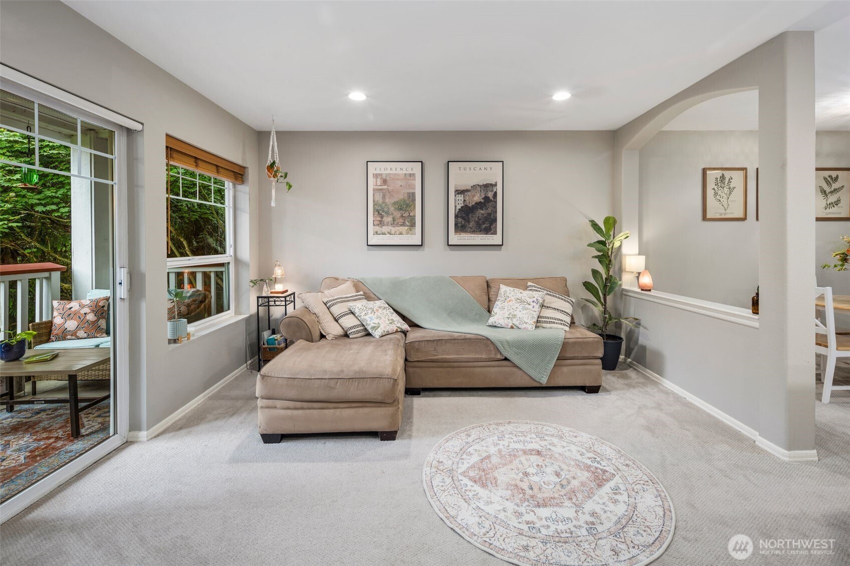 18501 Southeast Newport Way, Unit H236 Issaquah, WA 98027 - Photo 1 of 20 a living room with furniture and a large window