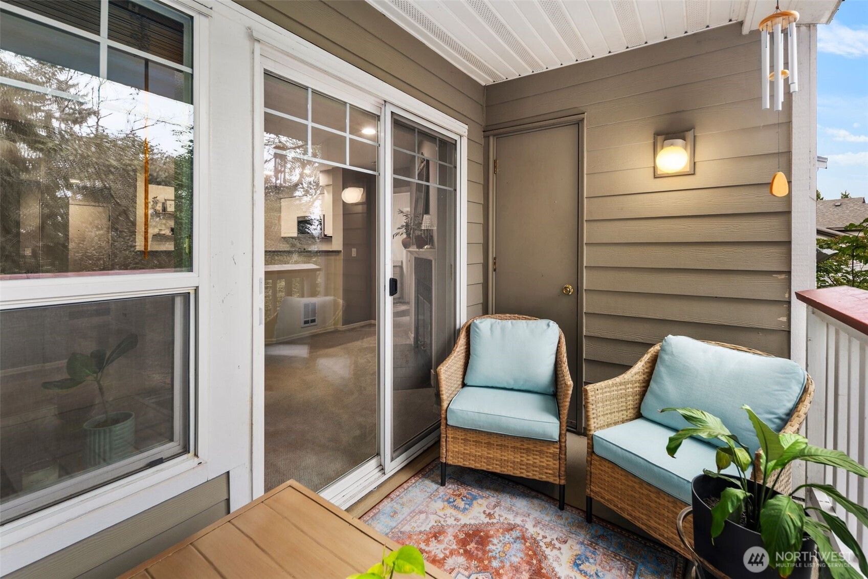 18501 Southeast Newport Way, Unit H236 Issaquah, WA 98027 - Photo 18 of 20 a building outdoor space with patio furniture