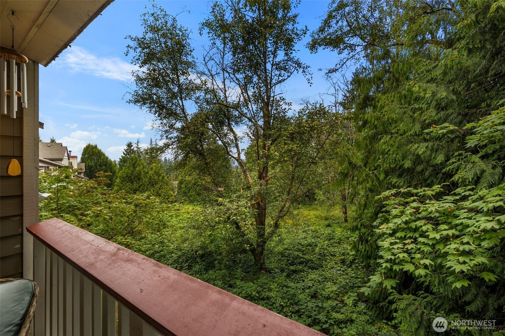 18501 Southeast Newport Way, Unit H236 Issaquah, WA 98027 - Photo 19 of 20 a view of a forest from a balcony