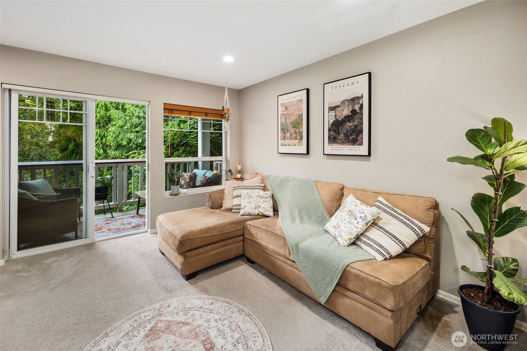 18501 Southeast Newport Way, Unit H236 Issaquah, WA 98027 - Photo 6 of 20 a living room with furniture and a large window