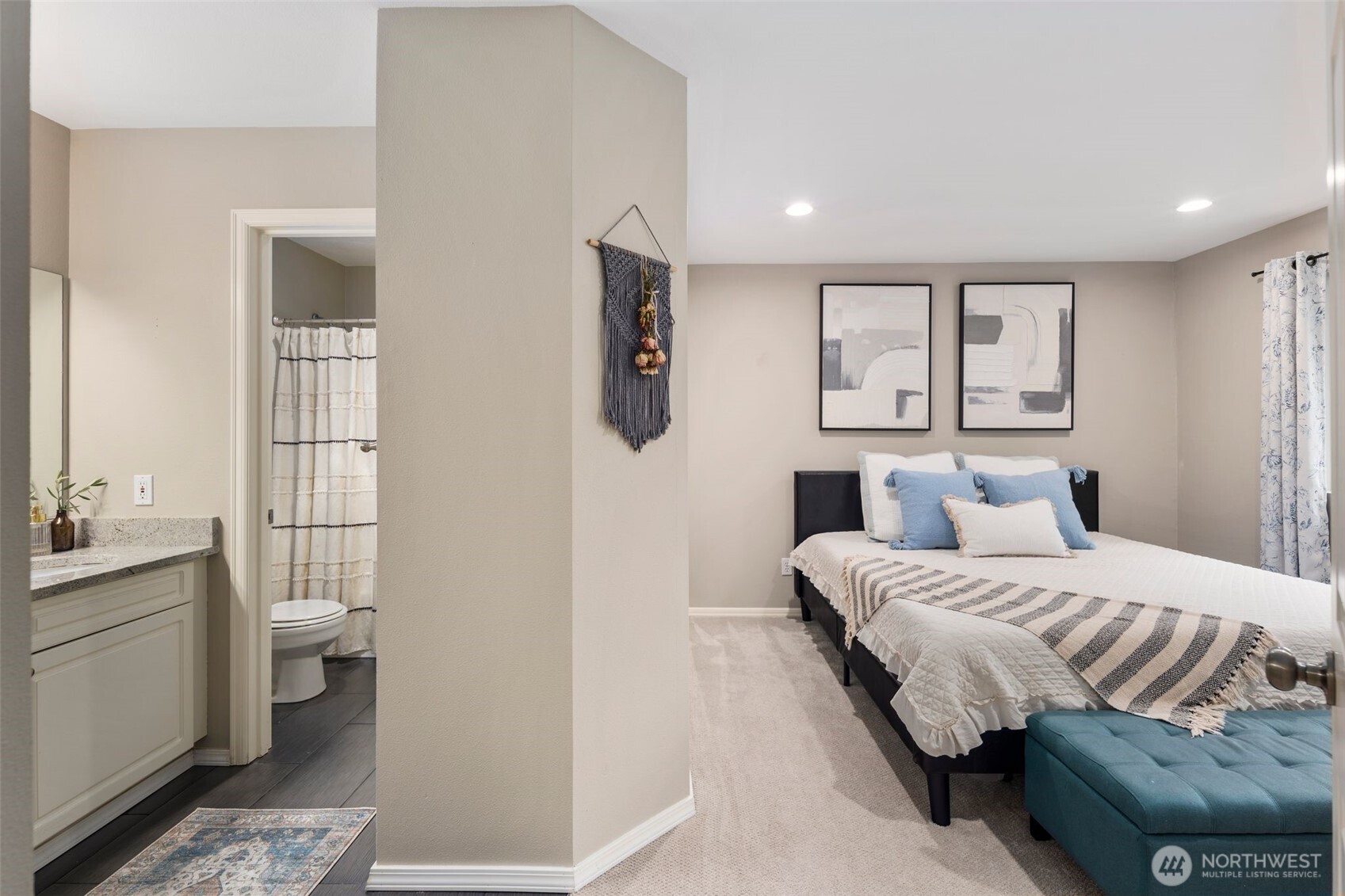 18501 Southeast Newport Way, Unit H236 Issaquah, WA 98027 - Photo 10 of 20 a bedroom with a bed and a night stand