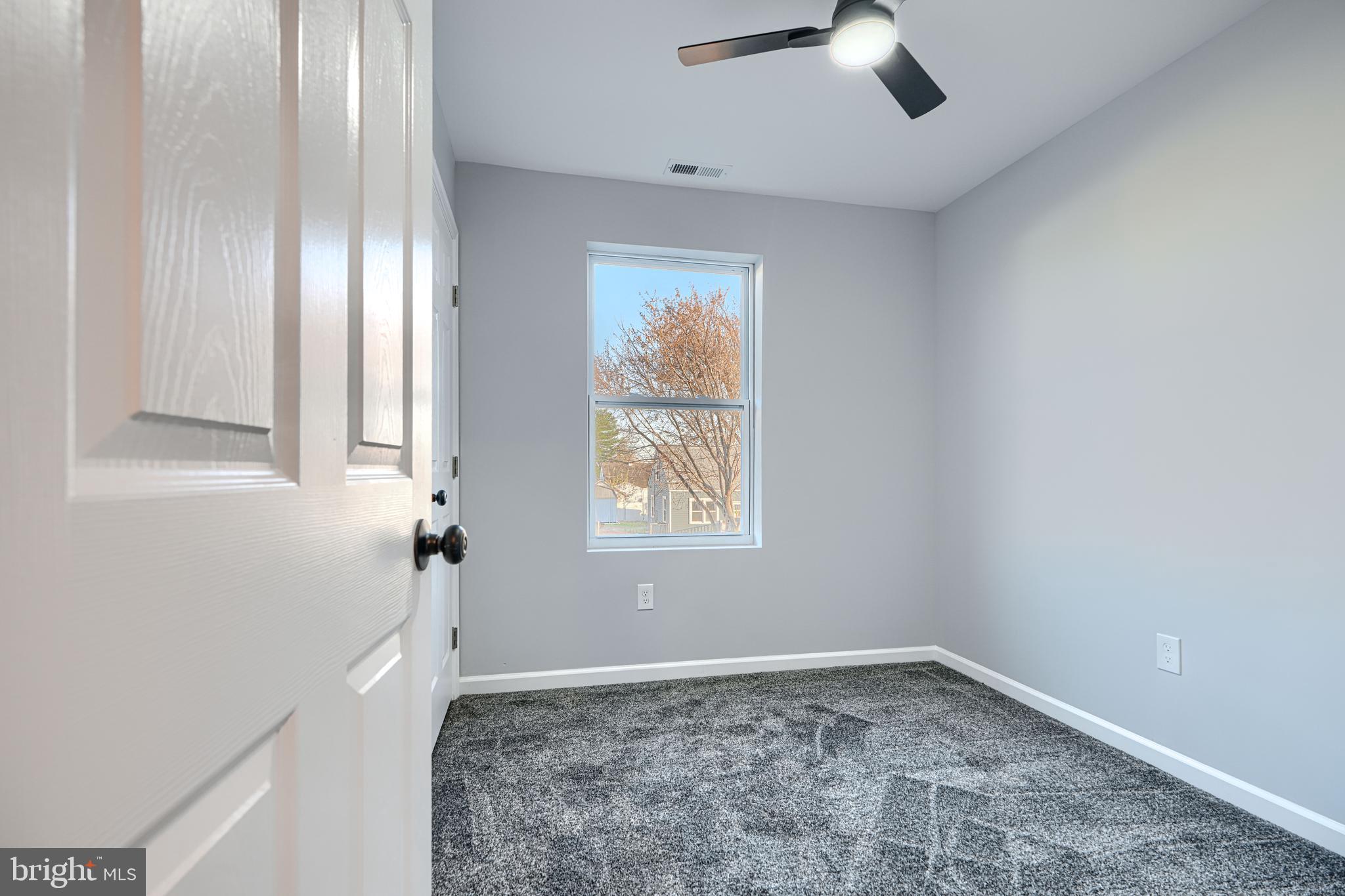 9 Avenal Road Baltimore, MD 21221 - Photo 17 of 30 a view of an empty room and window