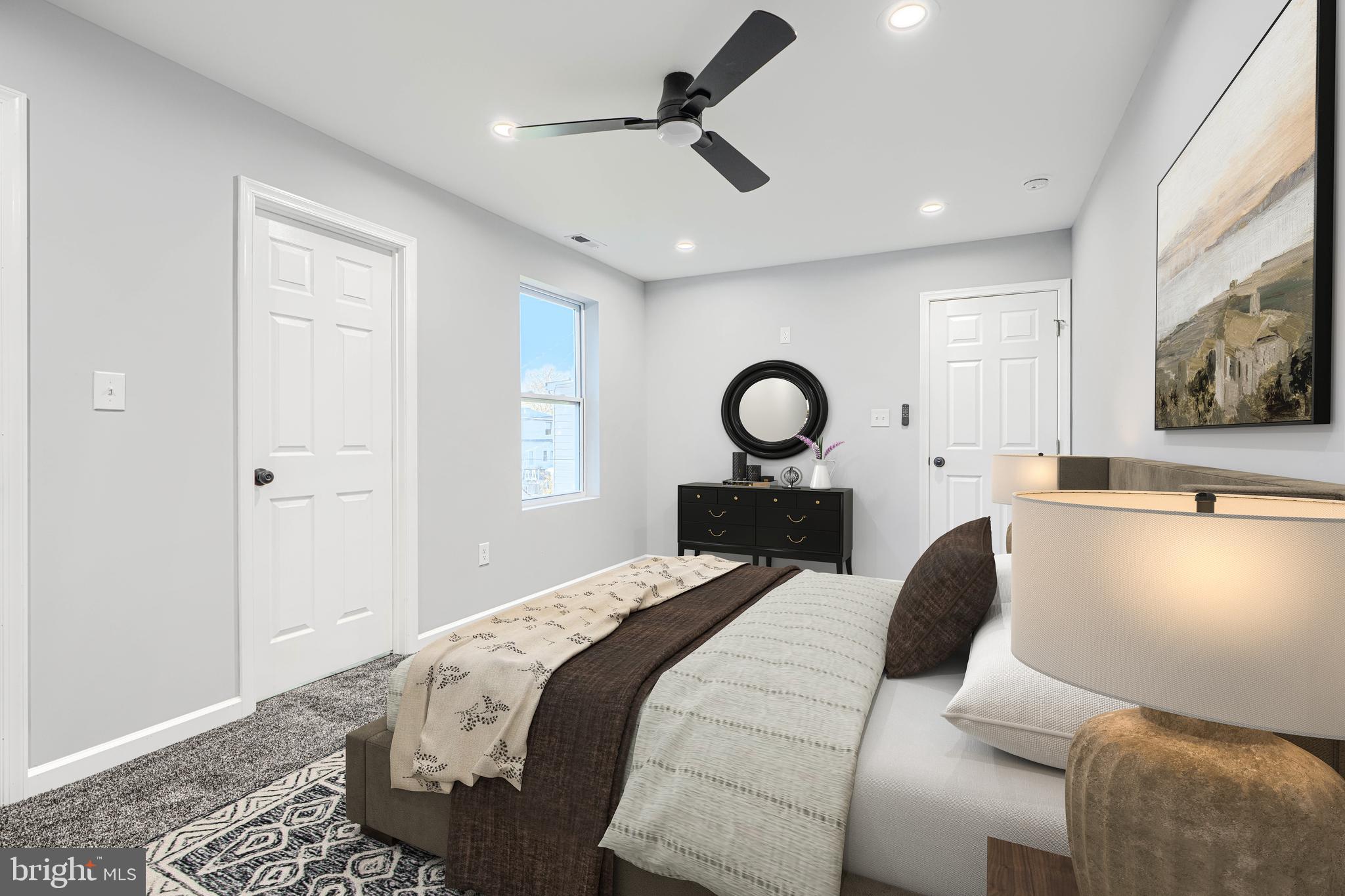 9 Avenal Road Baltimore, MD 21221 - Photo 24 of 30 a bedroom with a bed and ceiling fan