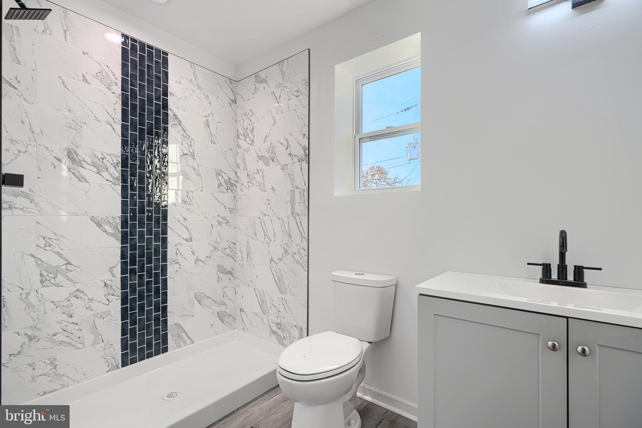 9 Avenal Road Baltimore, MD 21221 - Photo 27 of 30 a bathroom with a toilet sink and shower