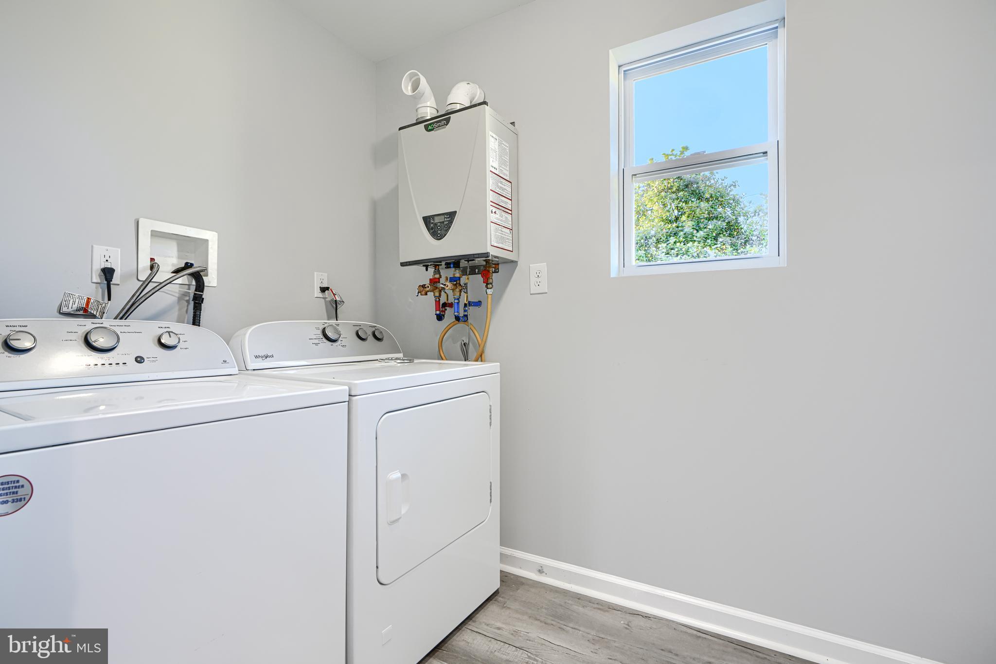 9 Avenal Road Baltimore, MD 21221 - Photo 30 of 30 a utility room with dryer and washer