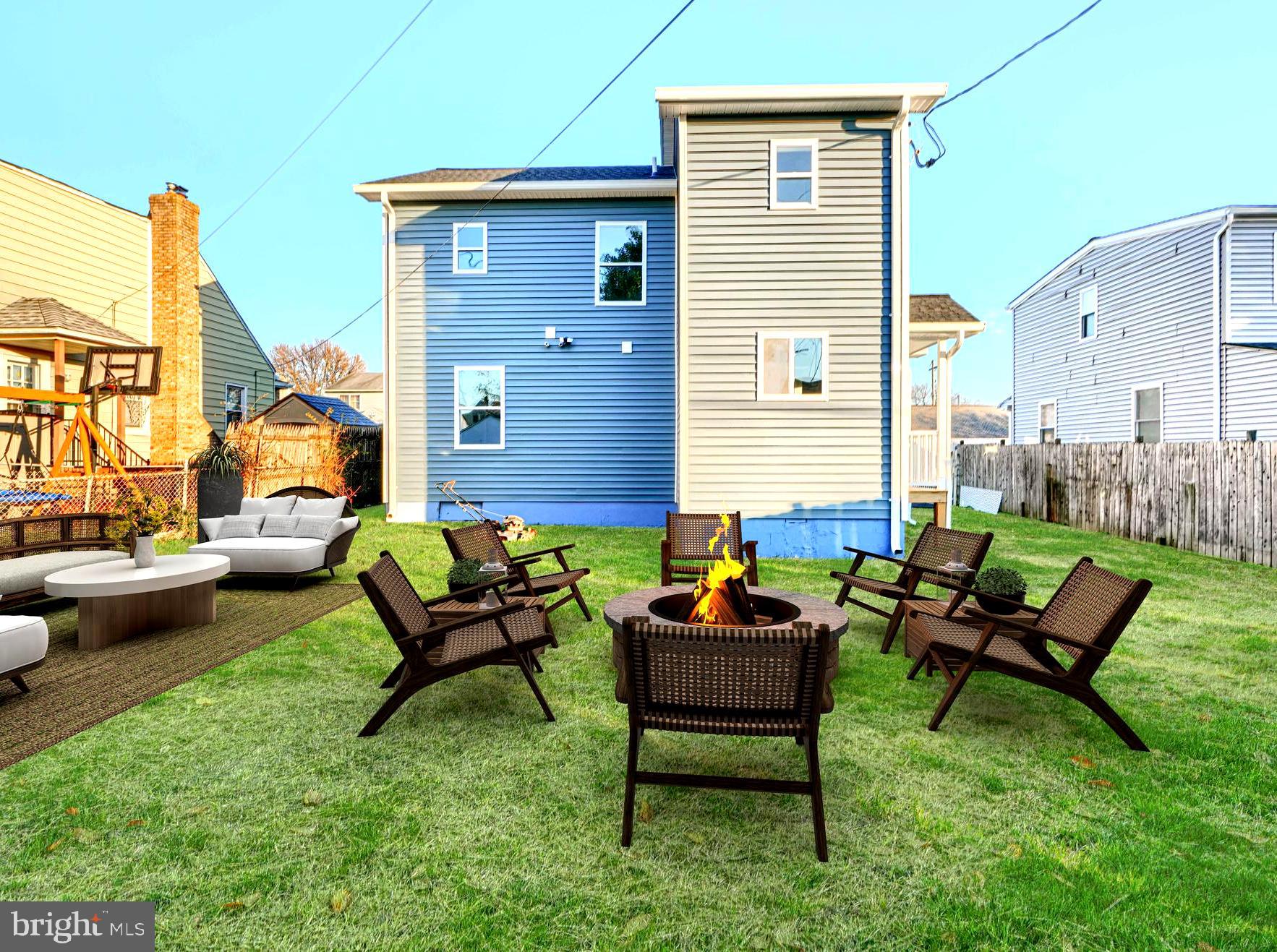 9 Avenal Road Baltimore, MD 21221 - Photo 3 of 30 a backyard of a house with table and chairs