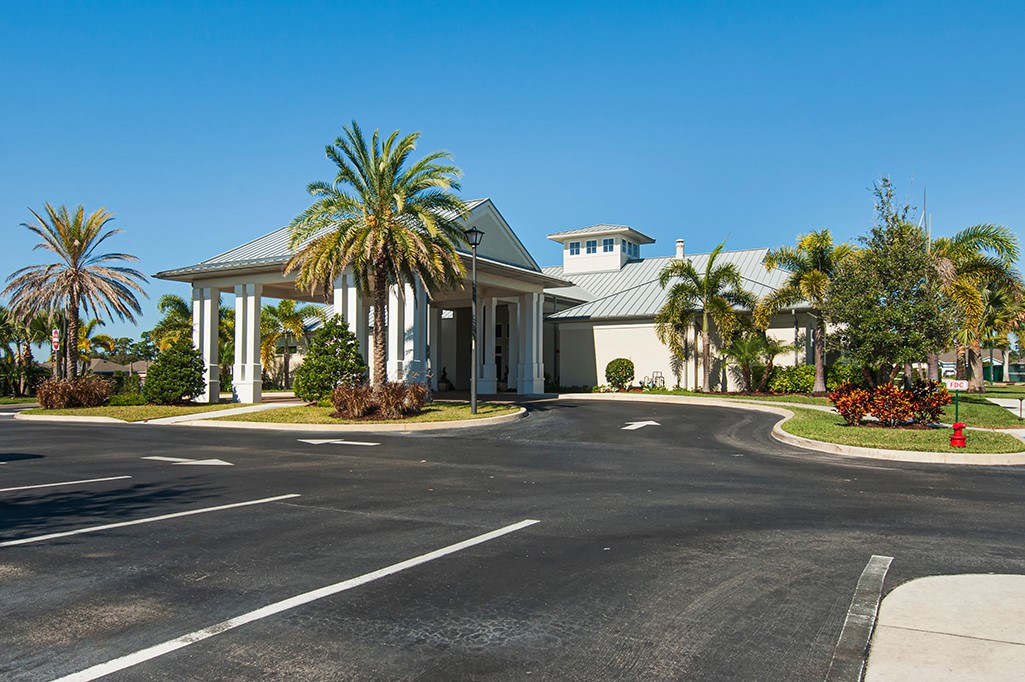 6187 Red Maple Manor Vero Beach, FL 32966 - Photo 26 of 31 a view of a white house with a street