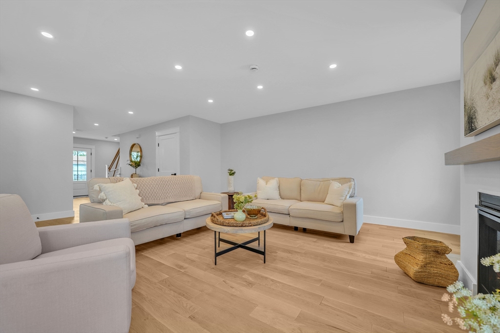 12 Hayes Street, Unit 1 Acushnet, MA 02743 - Photo 11 of 26 a living room with furniture and a couch