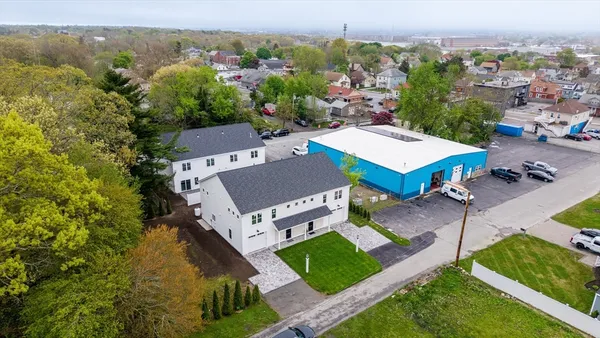 an aerial view of a house with a garden