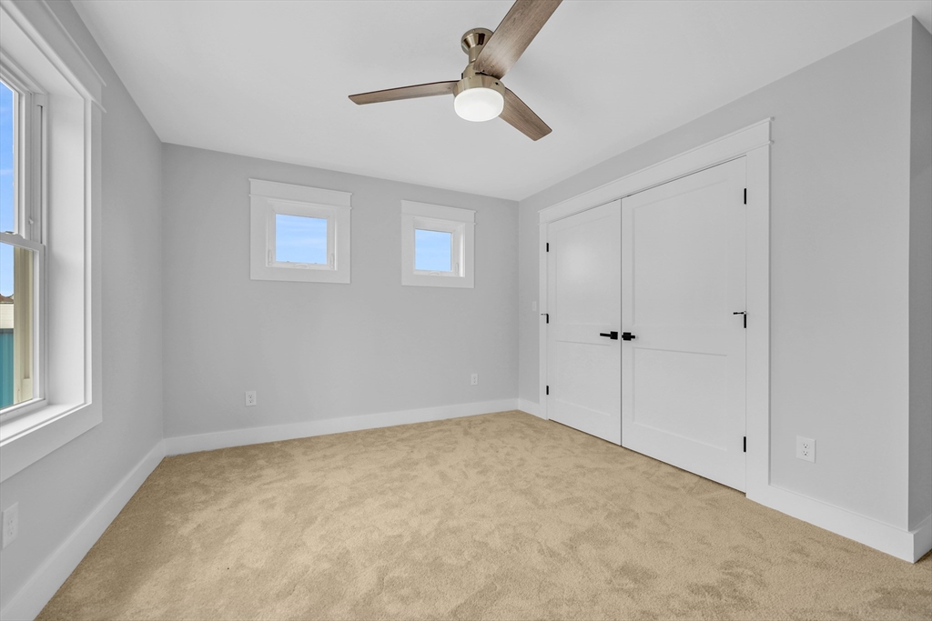 12 Hayes Street, Unit 1 Acushnet, MA 02743 - Photo 21 of 26 a view of an empty room with a window