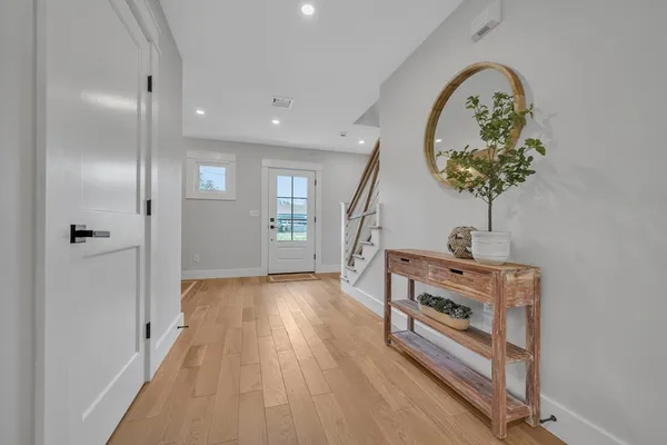 a room with furniture and a wooden floor
