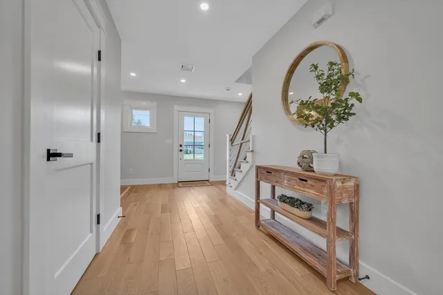 a room with furniture and a wooden floor