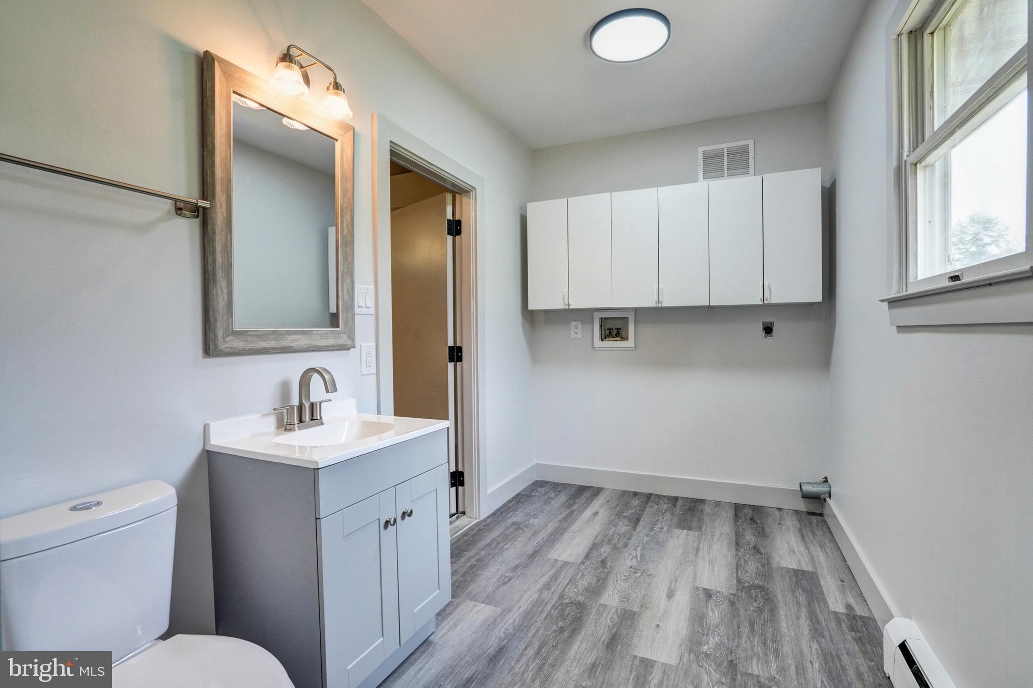 125 Rugby Road Birdsboro, PA 19508 - Photo 56 of 59 Full bath and laundry off garage and kitchen