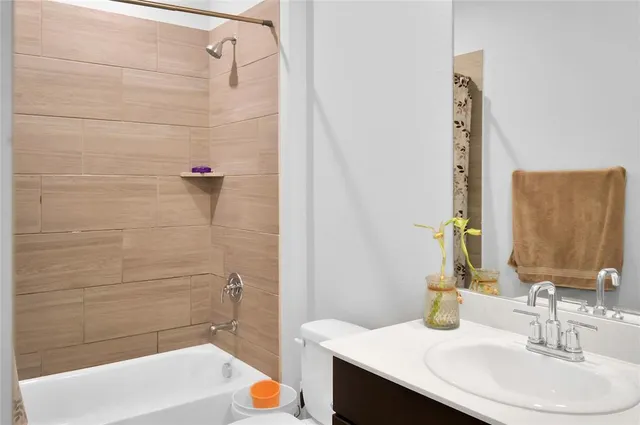 a bathroom with a sink and a bathtub