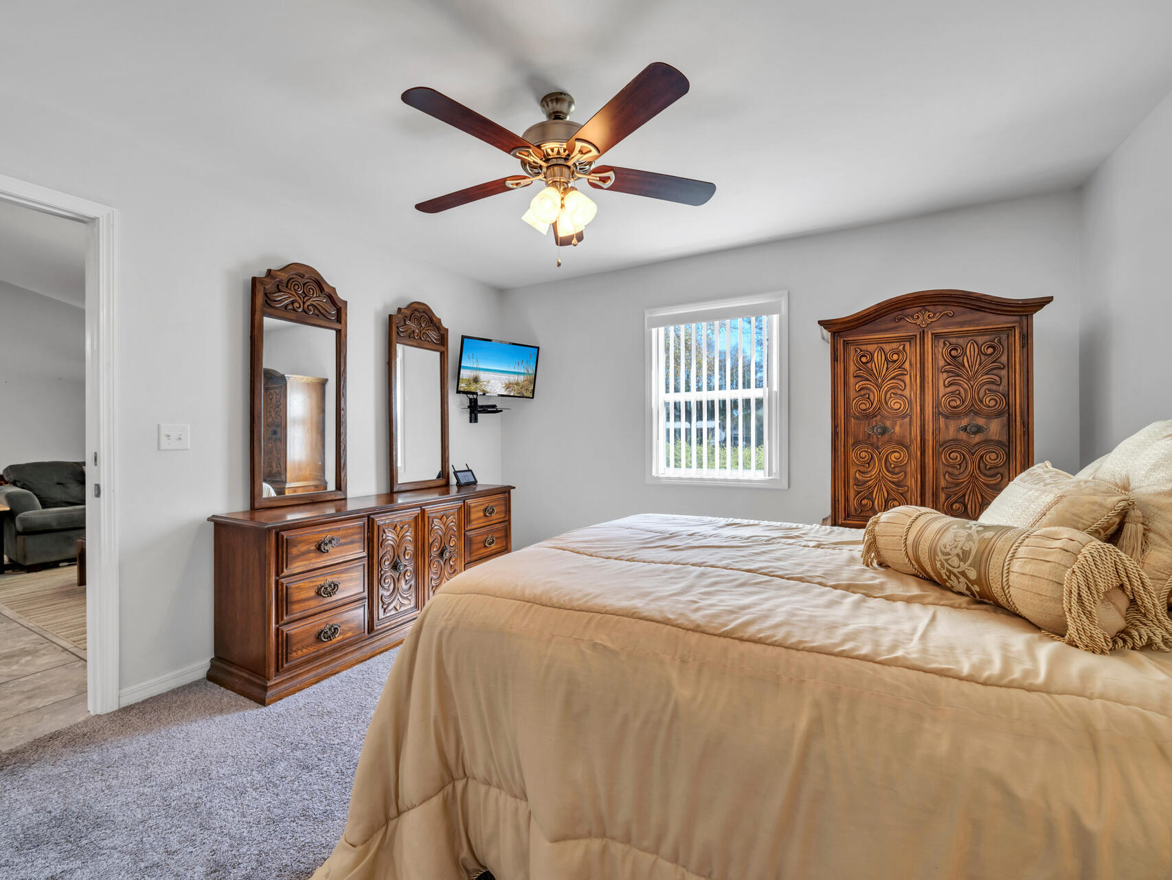 5346 Fox Hound Lane Baker, FL 32531 - Photo 20 of 46 a bedroom with a bed dresser and a large mirror