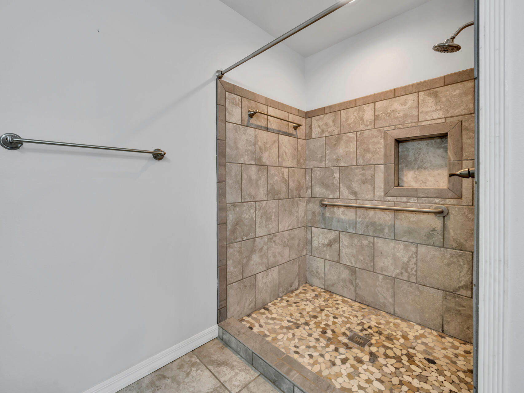 5346 Fox Hound Lane Baker, FL 32531 - Photo 22 of 46 a bathroom with a shower