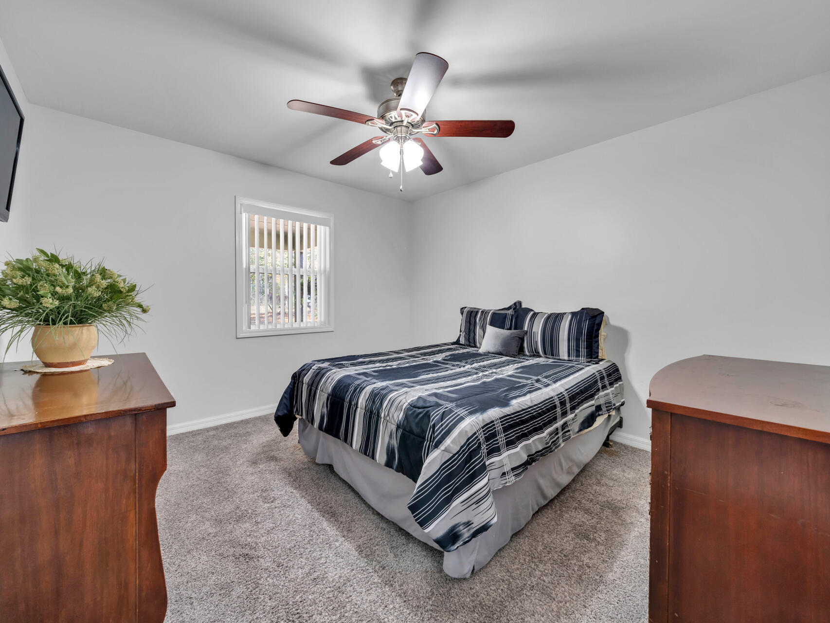 5346 Fox Hound Lane Baker, FL 32531 - Photo 27 of 46 a bedroom with a bed and window