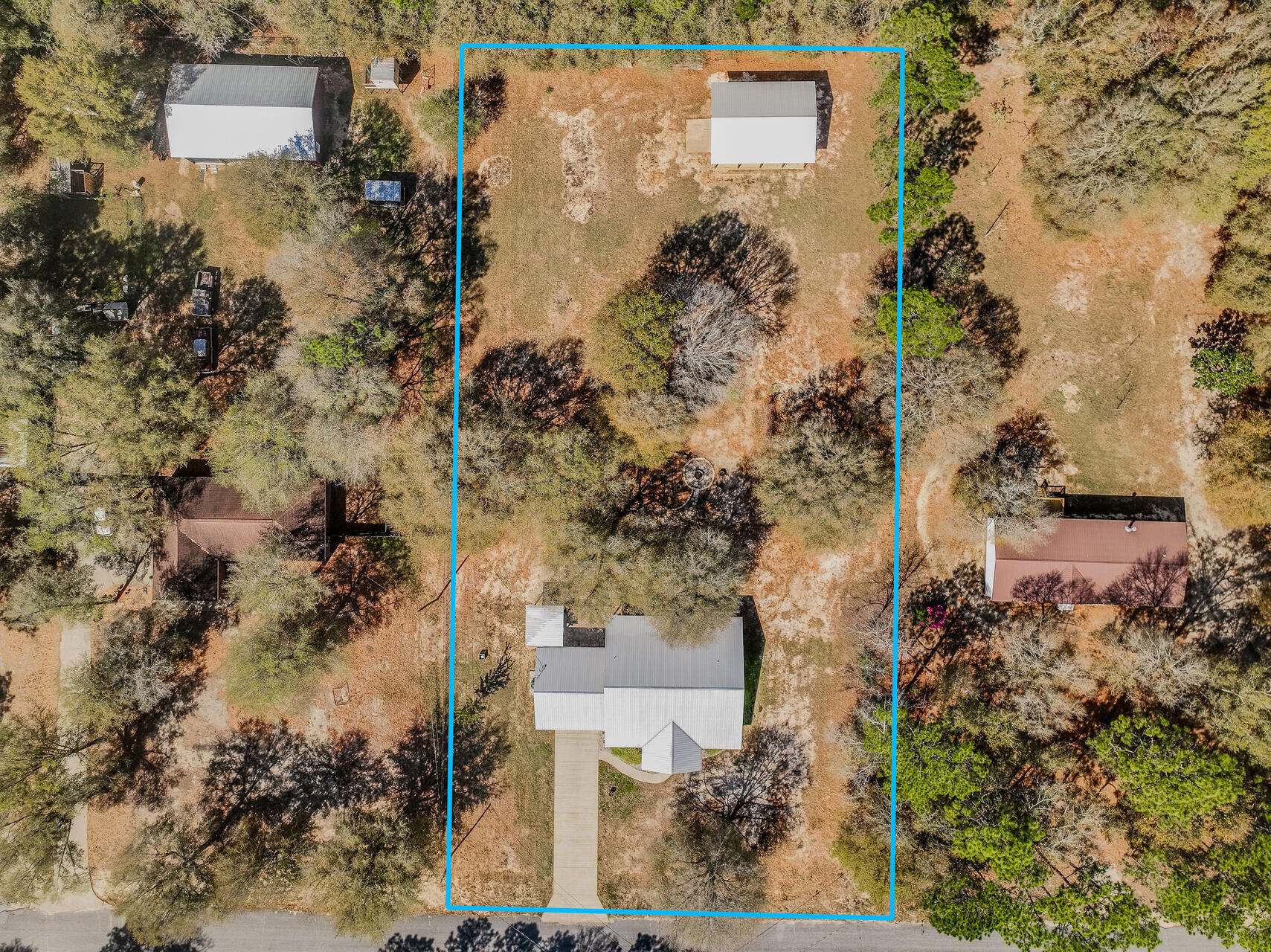 5346 Fox Hound Lane Baker, FL 32531 - Photo 3 of 46 an aerial view of a house with a yard