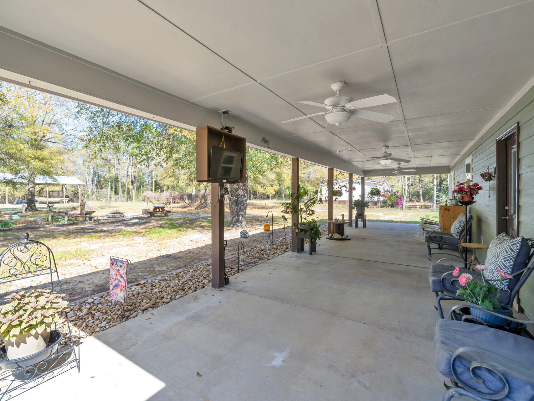 5346 Fox Hound Lane Baker, FL 32531 - Photo 35 of 46 a view of a room with gym equipment